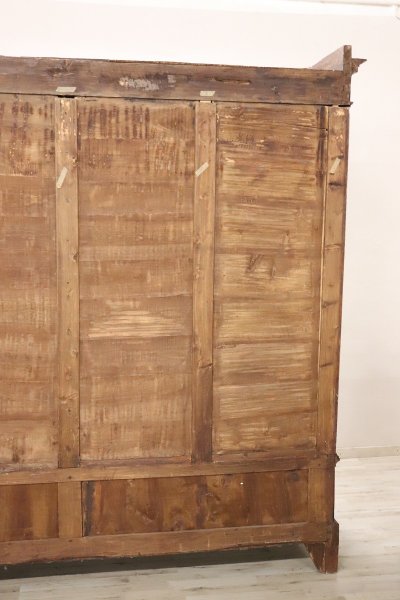 Very large 4 doors waedrobe in solid walnut, Italy Mid 19th century