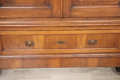 Very large 4 doors waedrobe in solid walnut, Italy Mid 19th century