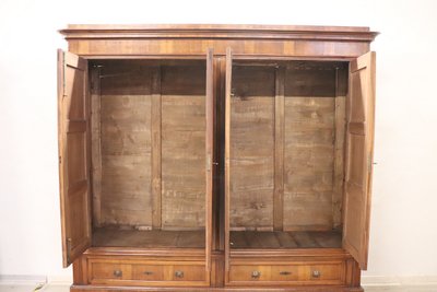 Very large 4 doors waedrobe in solid walnut, Italy Mid 19th century