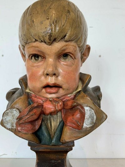 Terracotta bust depicting a young boy, 19th century