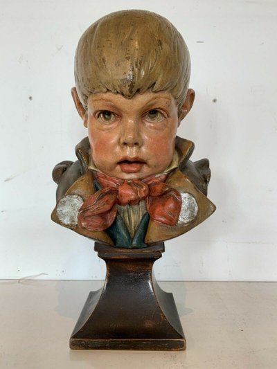 Terracotta bust depicting a young boy, 19th century