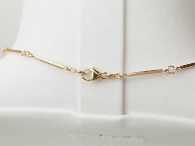 Collier boules en or rose 