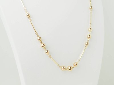 Collier boules en or rose 