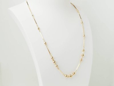 Collier boules en or rose 