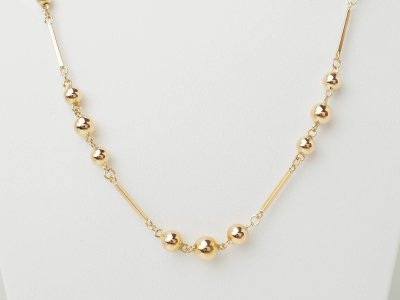 Collier boules en or rose 