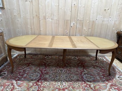Louis XV style round oak and leather dining room table