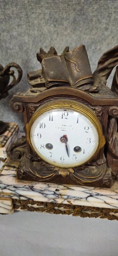 Large spelter clock set with a medal patina, Napoleon III period, circa 1880