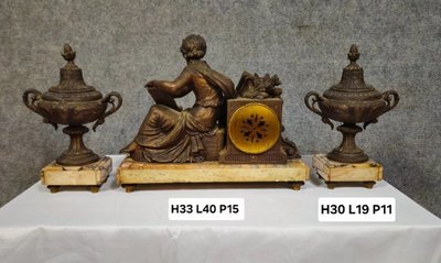 Large spelter clock set with a medal patina, Napoleon III period, circa 1880