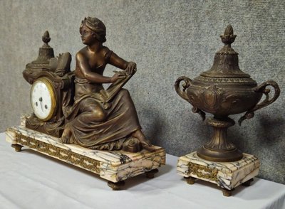 Large spelter clock set with a medal patina, Napoleon III period, circa 1880