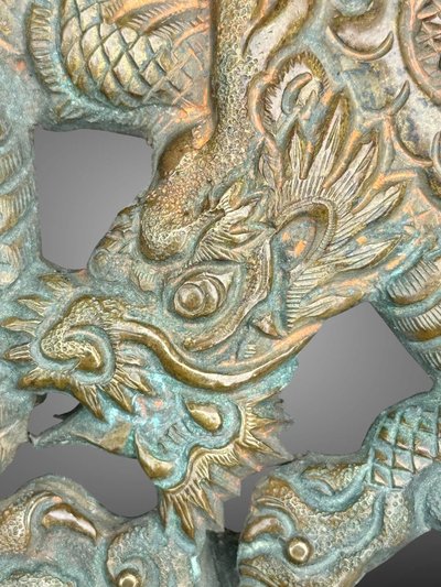 Embossed and finely engraved copper maedate featuring a dragon in clouds - Edo period. -