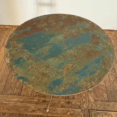 19th-century riveted wrought-iron table