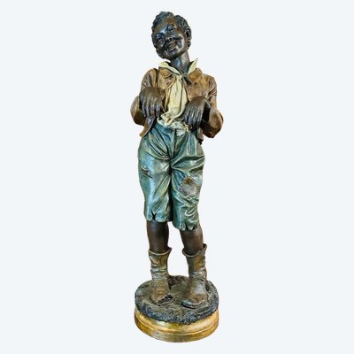 Smiling Gavroche from the beginning of the 20th century
