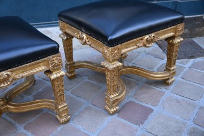 Pair of Louis XIV style gilded wood stools with struts