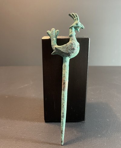Bactria, 3rd century B.C., bronze hairpin decorated with a stylized bird.