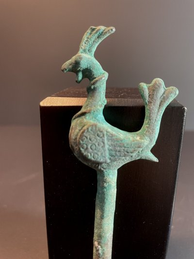 Bactria, 3rd century B.C., bronze hairpin decorated with a stylized bird.