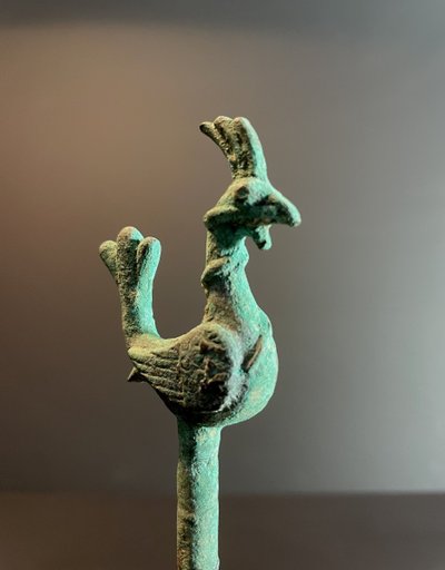 Bactria, 3rd century B.C., bronze hairpin decorated with a stylized bird.