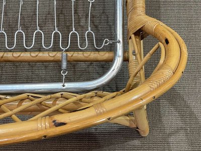 1960s rattan bed with its metal slatted base