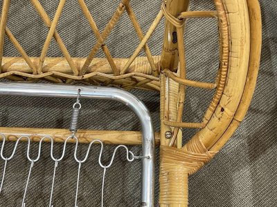 1960s rattan bed with its metal slatted base