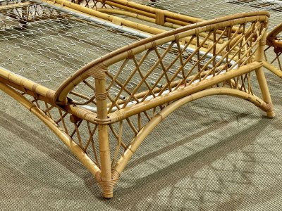1960s rattan bed with its metal slatted base