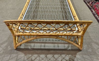 1960s rattan bed with its metal slatted base