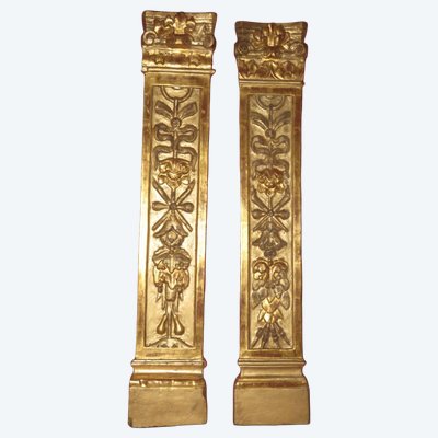 Coppia di sedie in legno dorato, XVIII secolo.