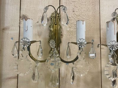 Pair of early 20th-century bronze wall sconces with crystal drops