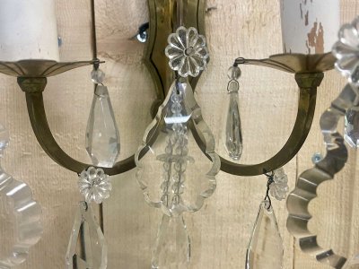 Pair of early 20th-century bronze wall sconces with crystal drops