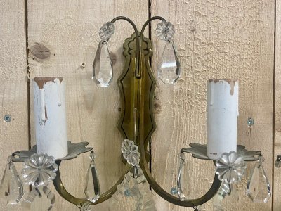 Pair of early 20th-century bronze wall sconces with crystal drops