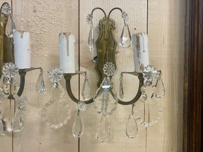 Pair of early 20th-century bronze wall sconces with crystal drops
