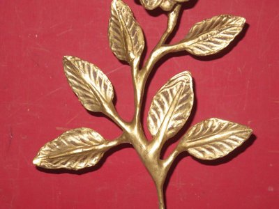 Vase with flower in gilded wood, 19th century.