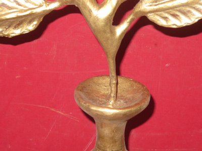 Vase with flower in gilded wood, 19th century.