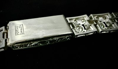 Art Deco bracelet in platinum and gold set with an emerald and 4.72 carats of diamonds