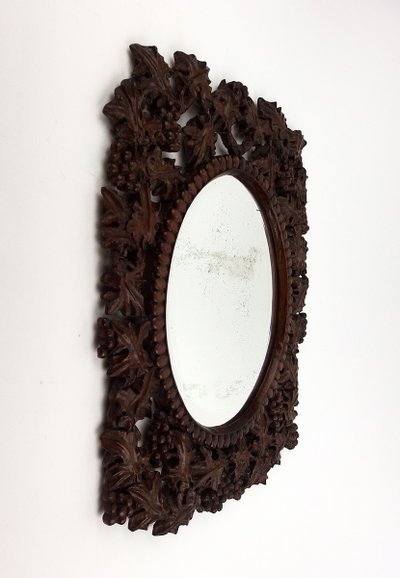 Miroir en bois sculpté