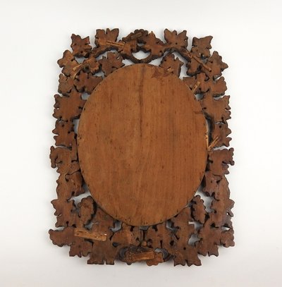Miroir en bois sculpté