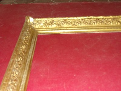 Cornice del XIX secolo in legno dorato.