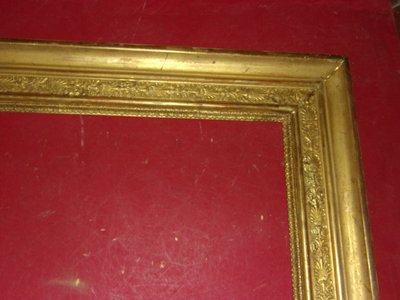 19th century Empire period frame in gilded wood.