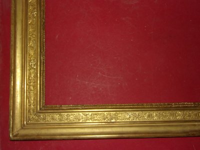 19th century Empire period frame in gilded wood.