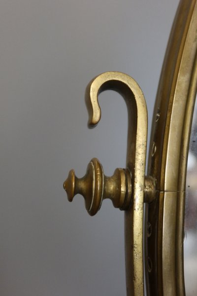 Specchio bifacciale in bronzo