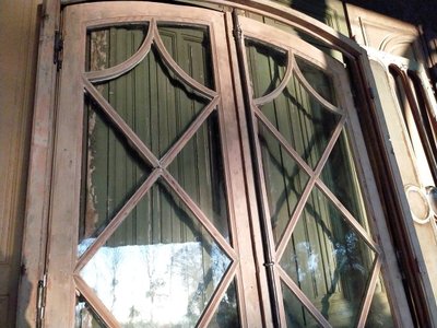 Antica porta francese proveniente da un castello, un'orangerie, un'officina o una soffitta del XIX secolo.