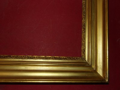 Cornice del XIX secolo in legno dorato.