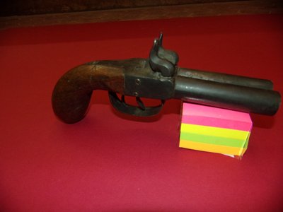 Pistolet percussion à double canon, époque 19ème.