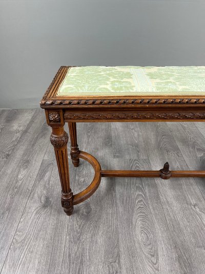 Banquette de style Louis XVI en bois sculpté, XIXe Siècle