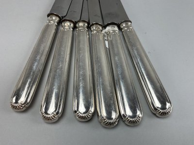 Six couteaux de table manche en argent 