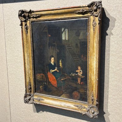 Tableau ancien représentant une scène d'intérieur, XVIIIe siècle, « FEMME AU ROUE-FILE », huile flamande sur toile, encadrée