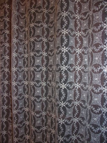 Curtain in embroidered tulle, early 20th century