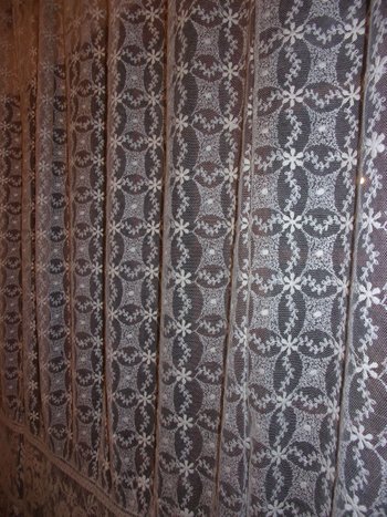 Curtain in embroidered tulle, early 20th century