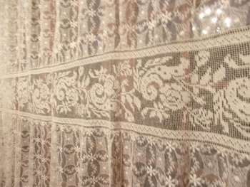 Curtain in embroidered tulle, early 20th century