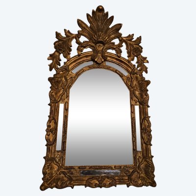 Louis XIV mirror with parecloses and palmettes, early 18th century.