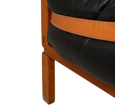 Pierre Chapo.  S22 two-seater sofa, in elm and black leather. 1970 LS6739