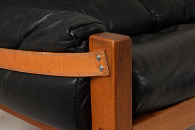 Pierre Chapo.  S22 two-seater sofa, in elm and black leather. 1970 LS6739